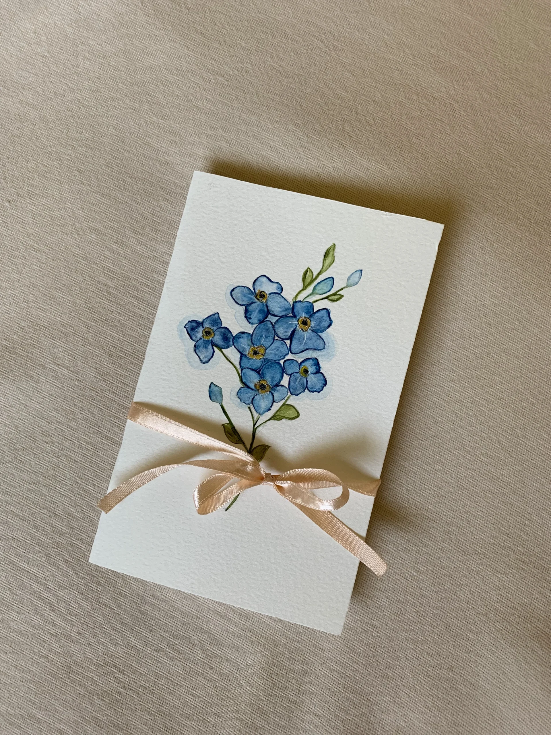 Cartão floral com laço